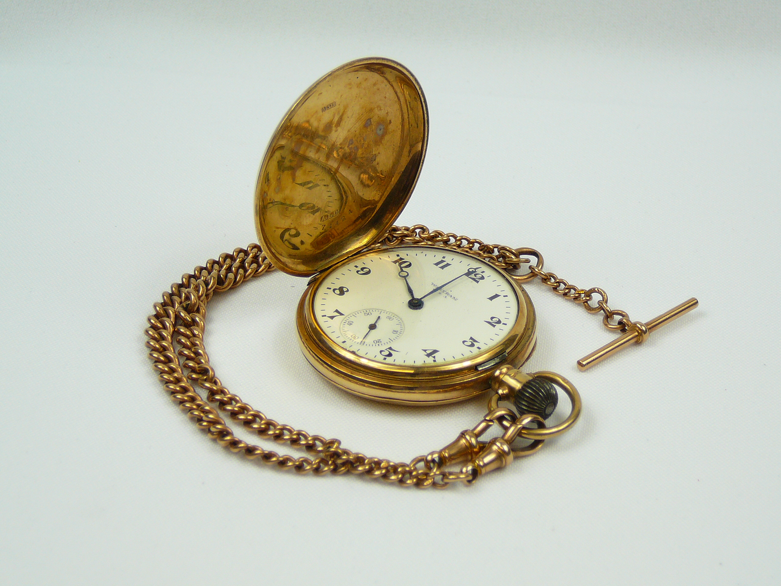 Gents gold pocket watch and chain