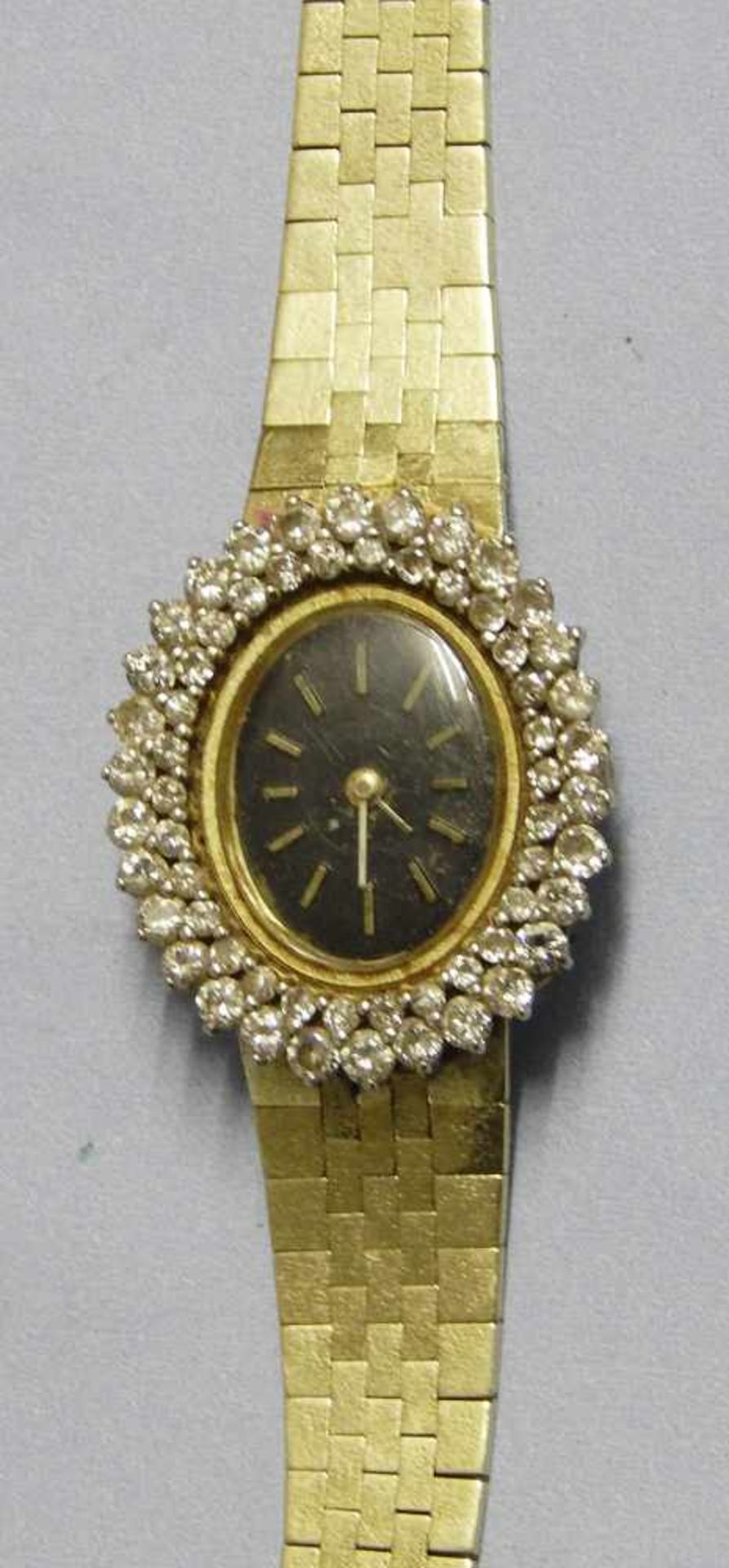 Damen-Armbanduhr, 585er Gelbgold mit aufwendigem Diamantbesatz, zusammen ca.2, 0ct, brutto ca.35, 25 - Image 2 of 2