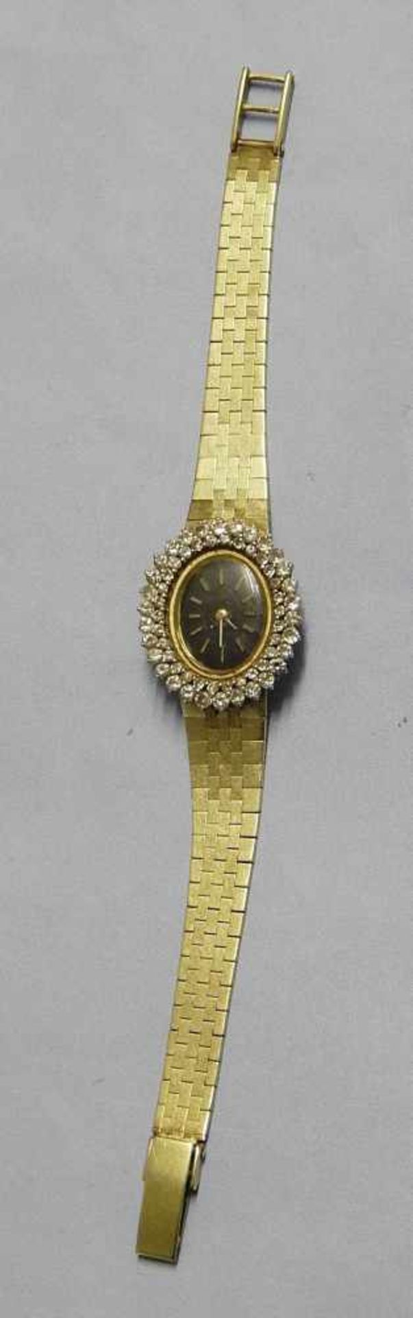 Damen-Armbanduhr, 585er Gelbgold mit aufwendigem Diamantbesatz, zusammen ca.2, 0ct, brutto ca.35, 25