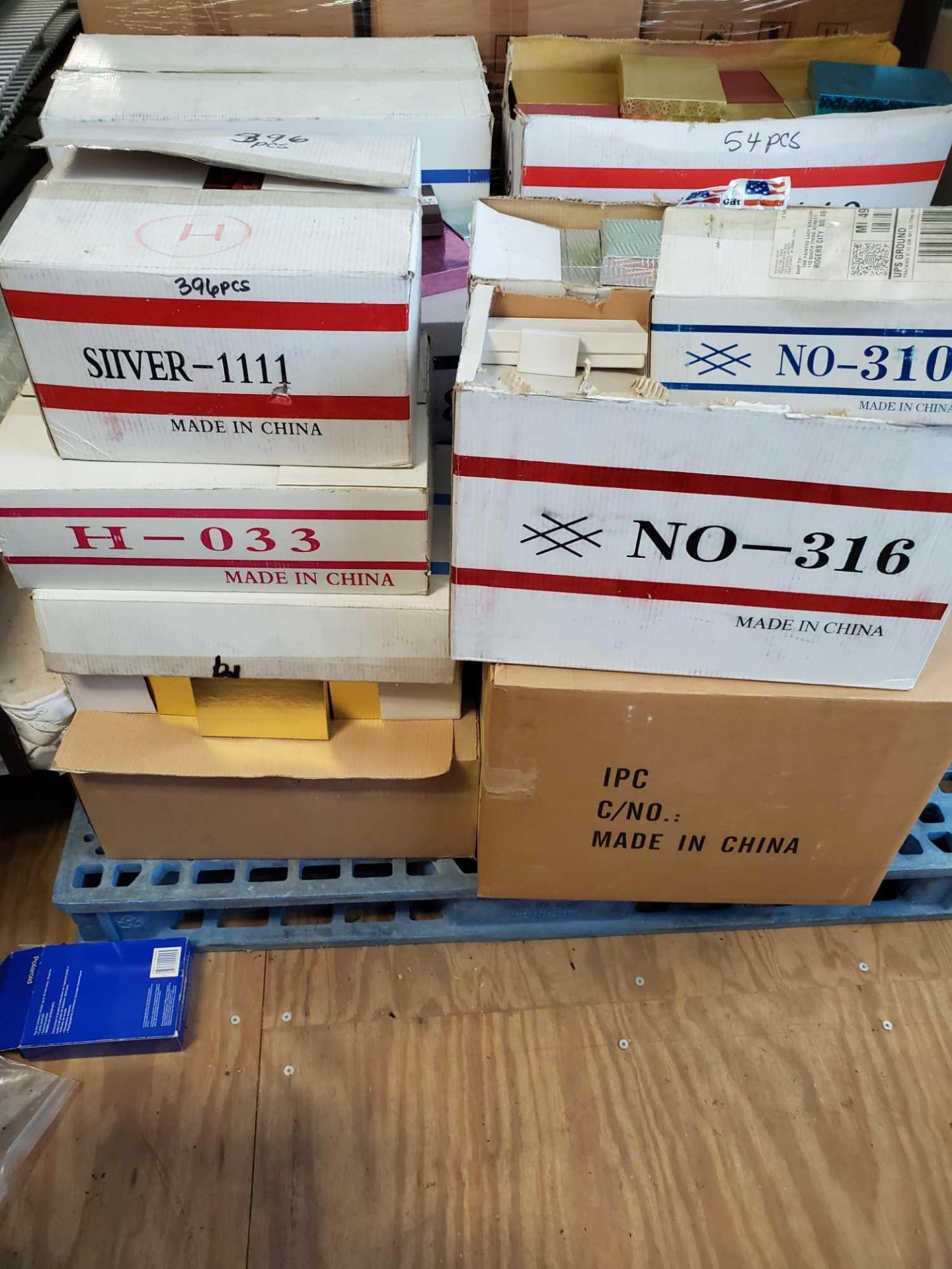 PALLET LOT OF MISC CASES OF BOXES.