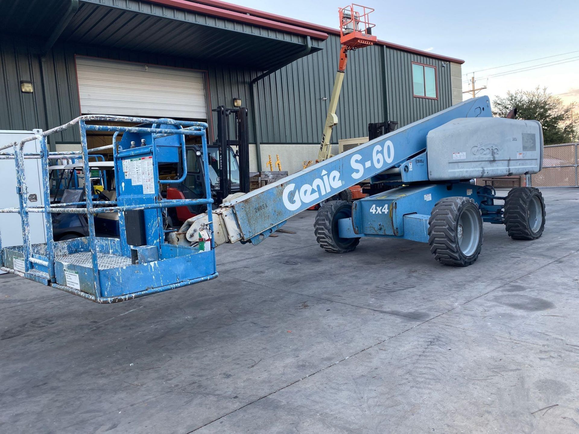 GENIE S-60 DIESEL 4 x 4 BOOM LIFT, 60' PLATFORM HEIGHT, RUNS & OPERATES