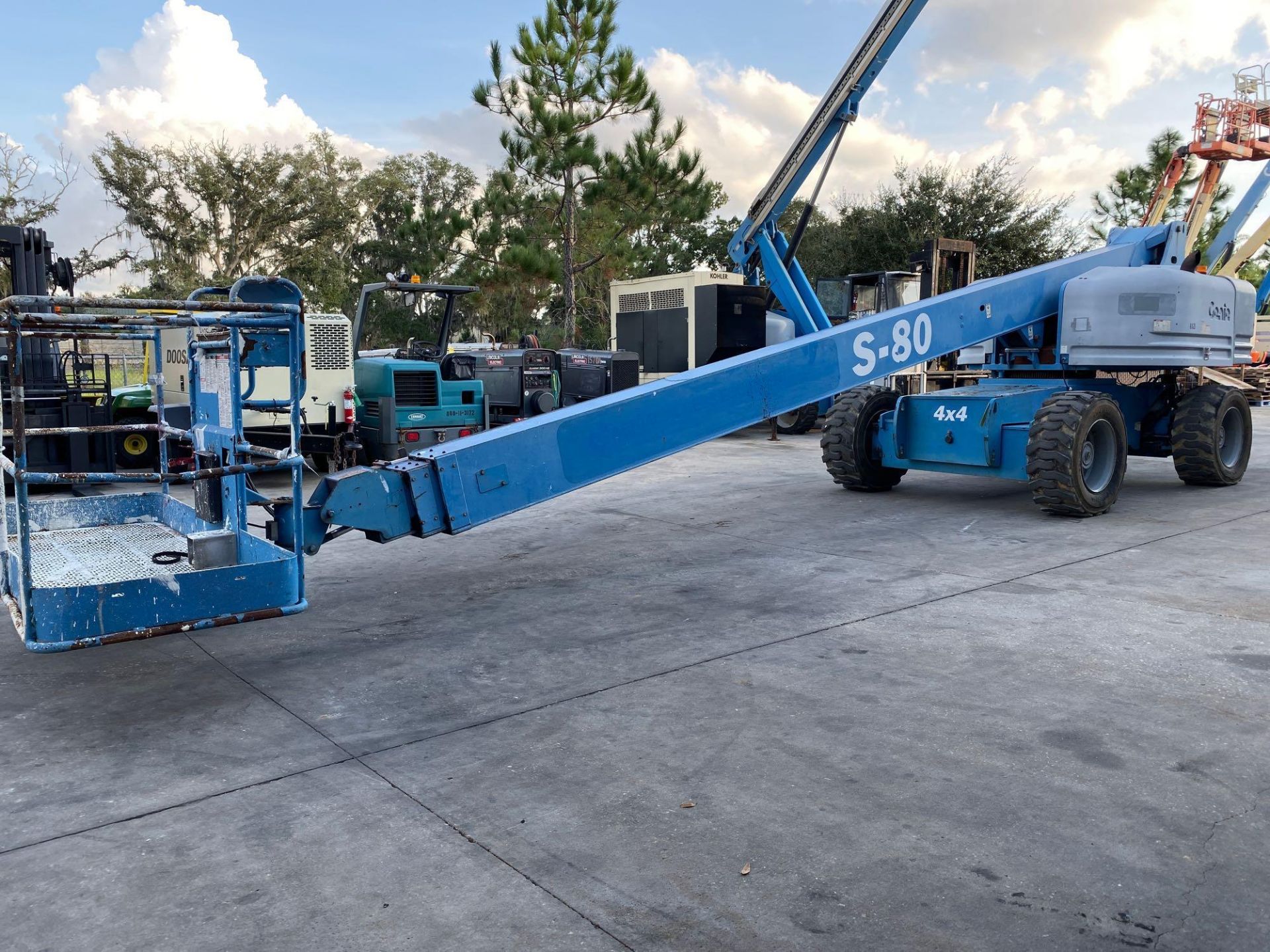 GENIE S-80 DIESEL BOOM LIFT, 4x4, EXTENDABLE/ SLIDE OUT WHEELS, 80' PLATFORM HEIGHT, RUNS & OPERATES