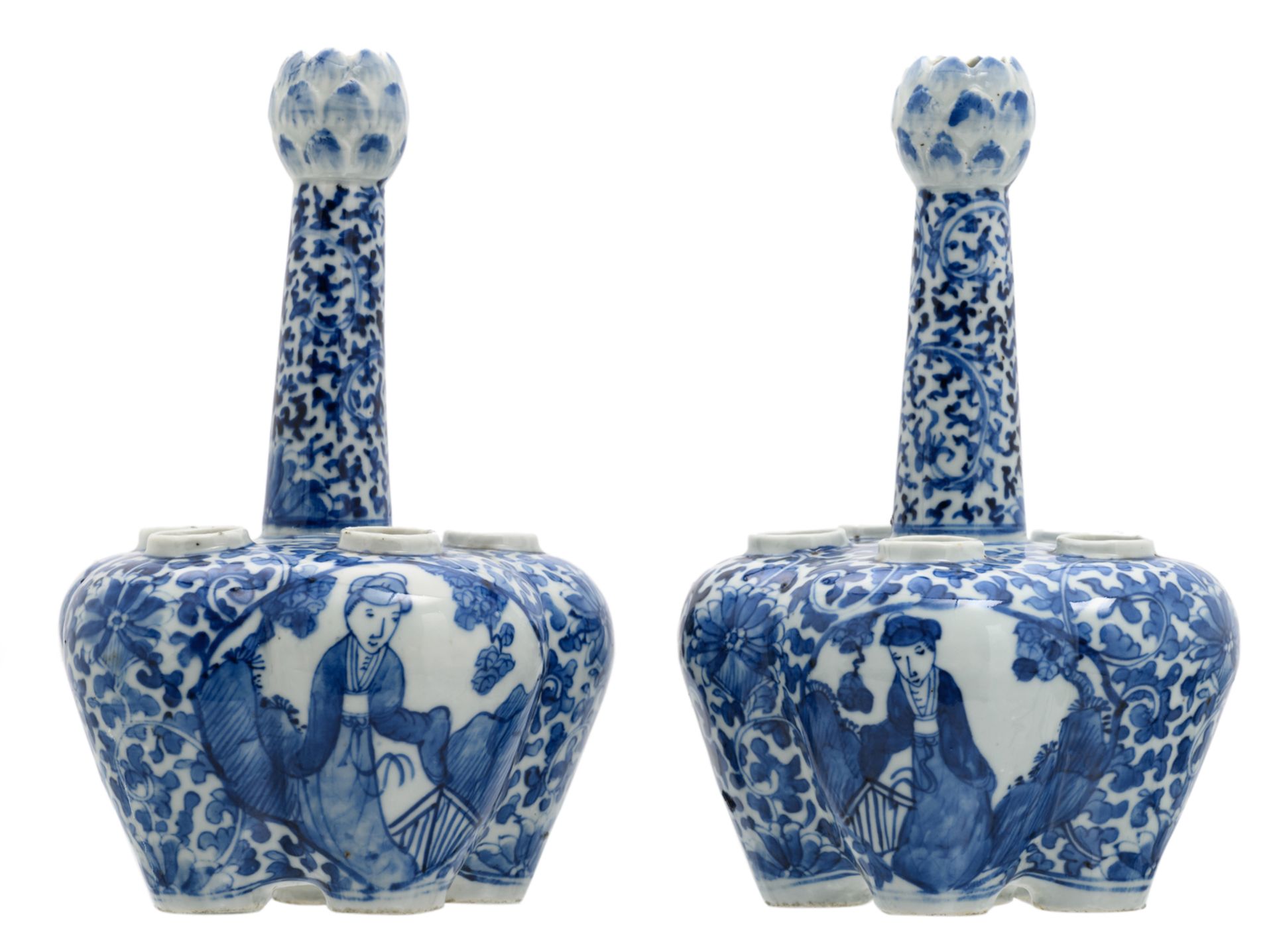 A pair of Chinese blue and white floral and relief decorated tulip vases, the roundels with figures