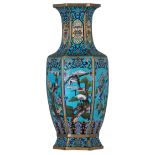 A Chinese hexagonal cloisonné enamel baluster shaped vase, the panels decorated with birds, flower b
