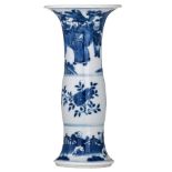 A small Chinese blue and white Kangxi type vase, decorated with figures and flowers, H 18 cm