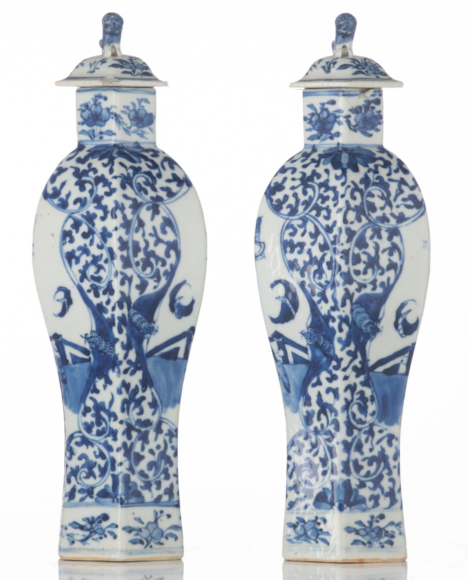 A pair of Chinese hexagonal porcelain vases and covers, blue and white decorated with figures in a p - Image 4 of 7