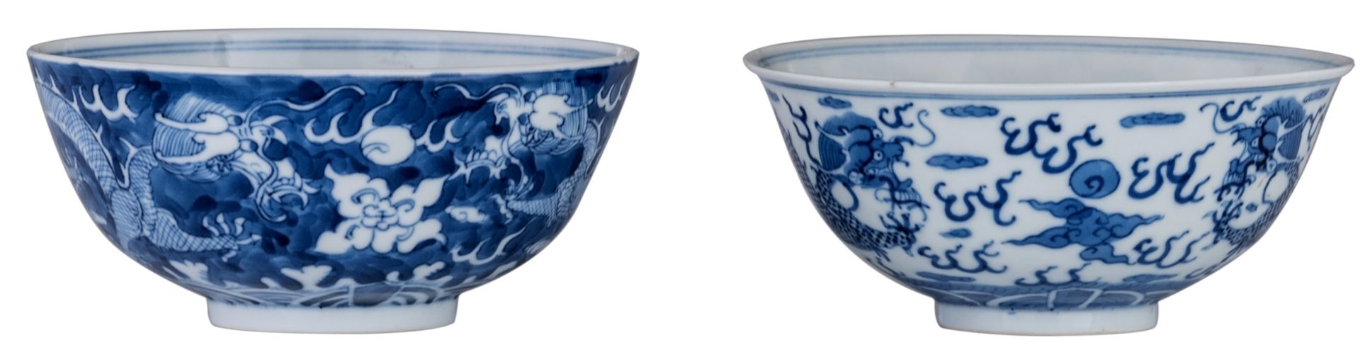 Two Chinese blue and white dragon decorated bowls, with a Kangxi mark, H 5,5 - 6 - ø 12,5 - 13 cm
