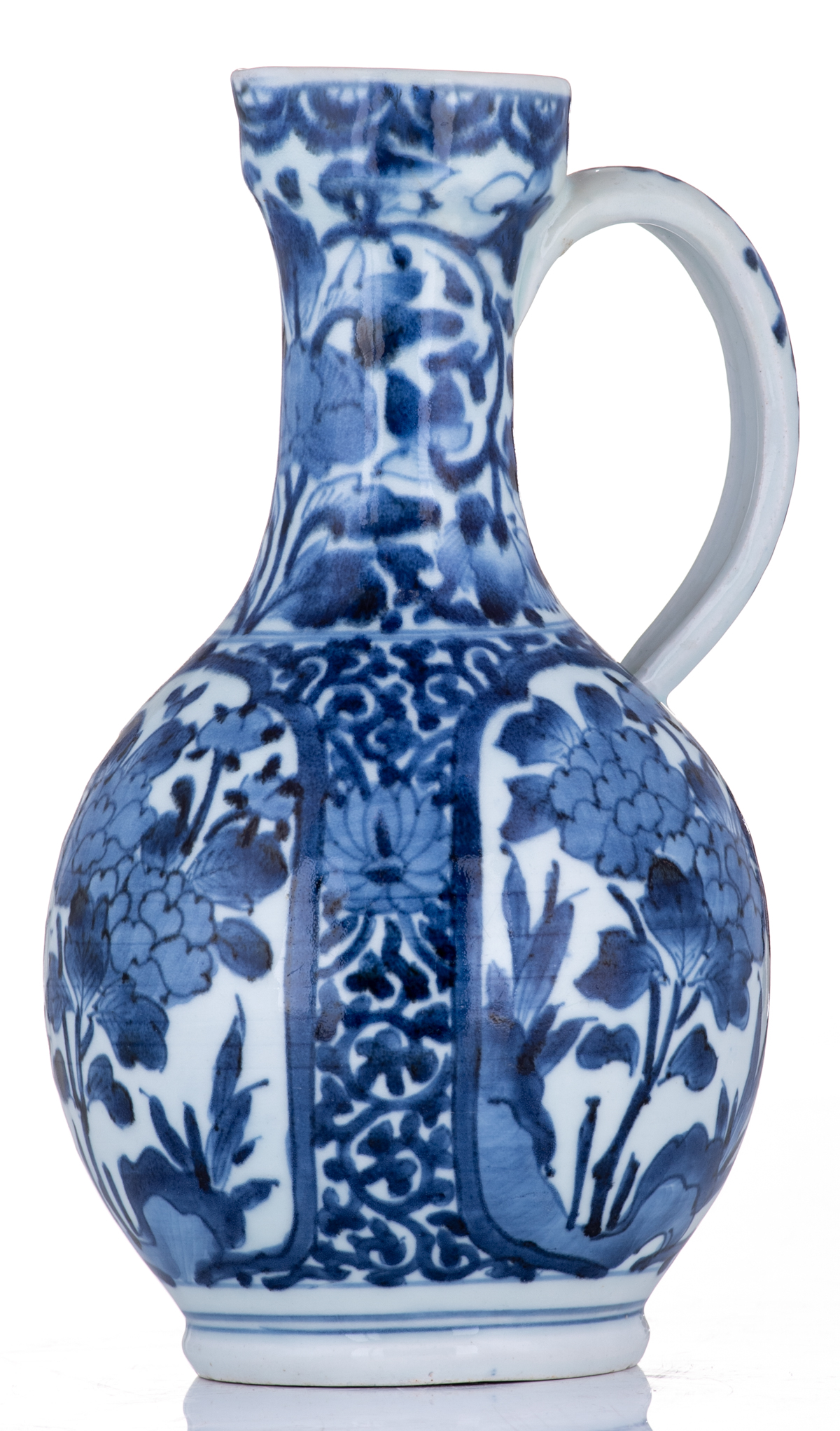 A Japanese last quarter of the 17thC Arita jug, with blue and white scrollwork all over, and roundel - Image 2 of 8
