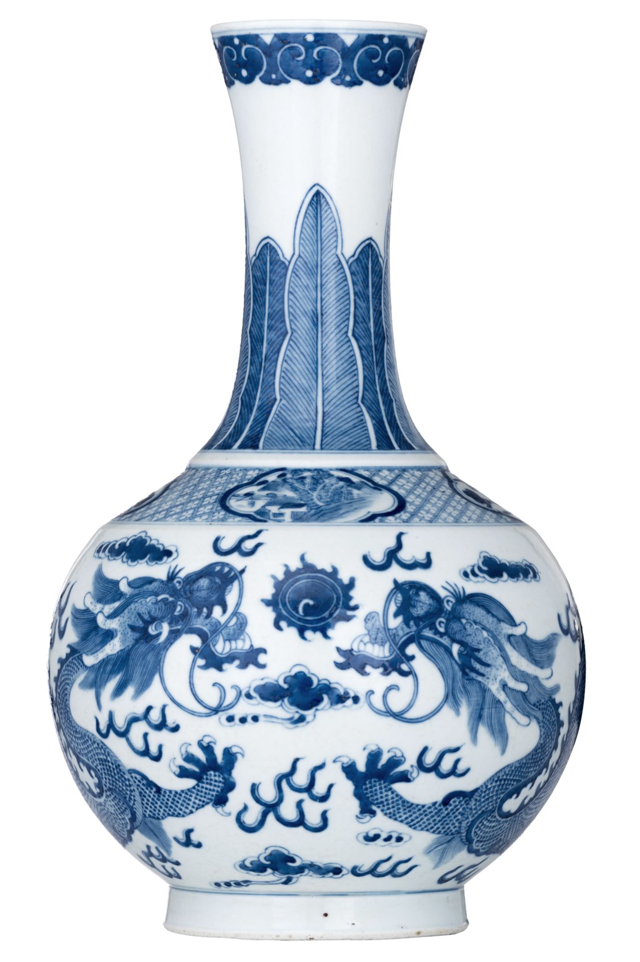 A Chinese blue and white bottle vase, decorated with dragons chasing the flaming pearl, H 39,5 cm