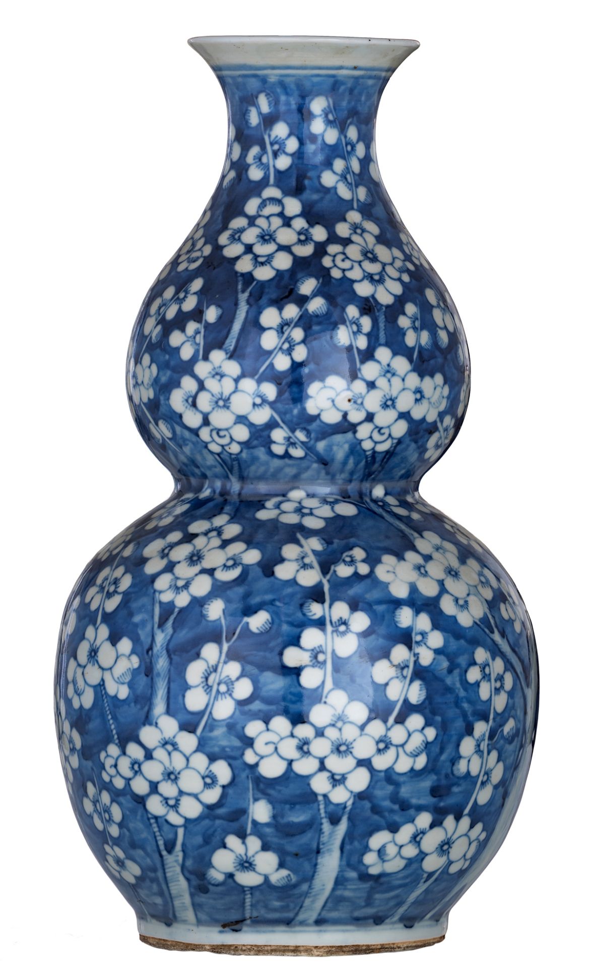 A Chinese blue and white double gourd vase, decorated with prunus, H 41,5 cm