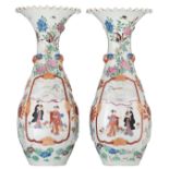 A pair of Japanese polychrome and relief decorated vases with fluted rims, marked, about 1900, H 60,