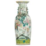 A Chinese polychrome vase, decorated with an animated scene, 19thC, H 61,5 cm