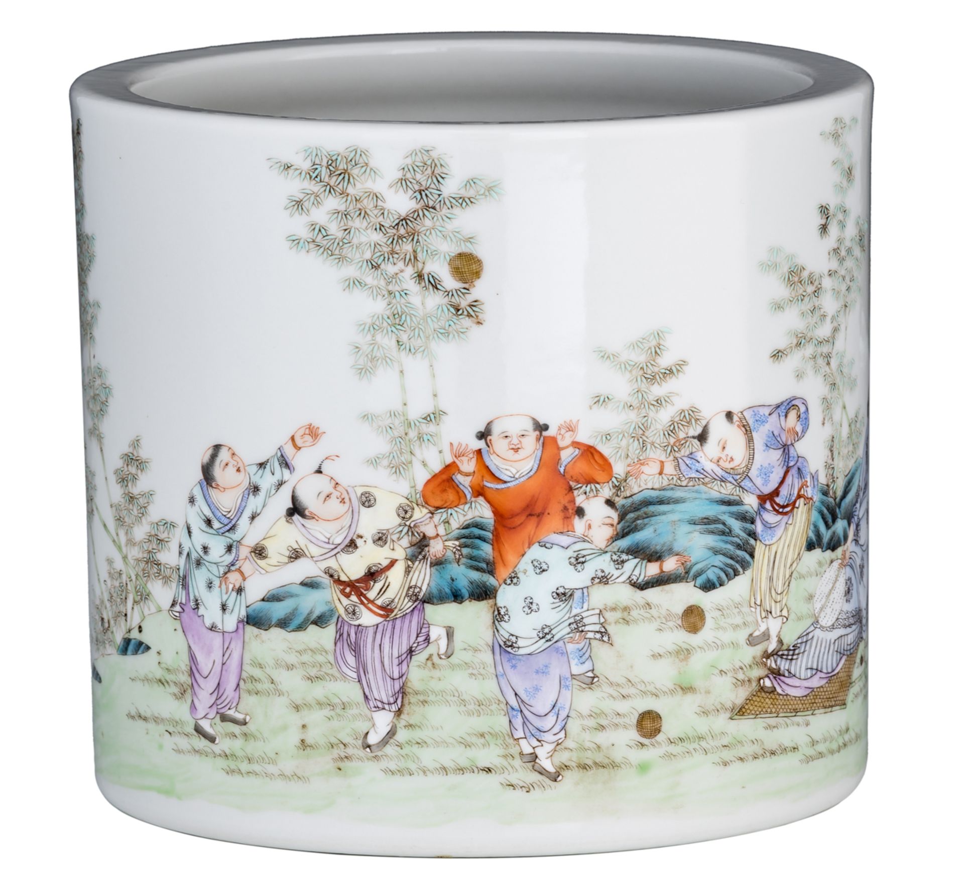 A Chinese famille rose brush pot, decorated with playing children in a garden, with a Qianlong mark,