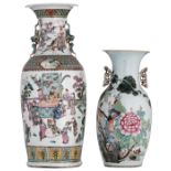 A Chinese famille rose vase, overall decorated with an animated court scene, the handles Fu lion sha