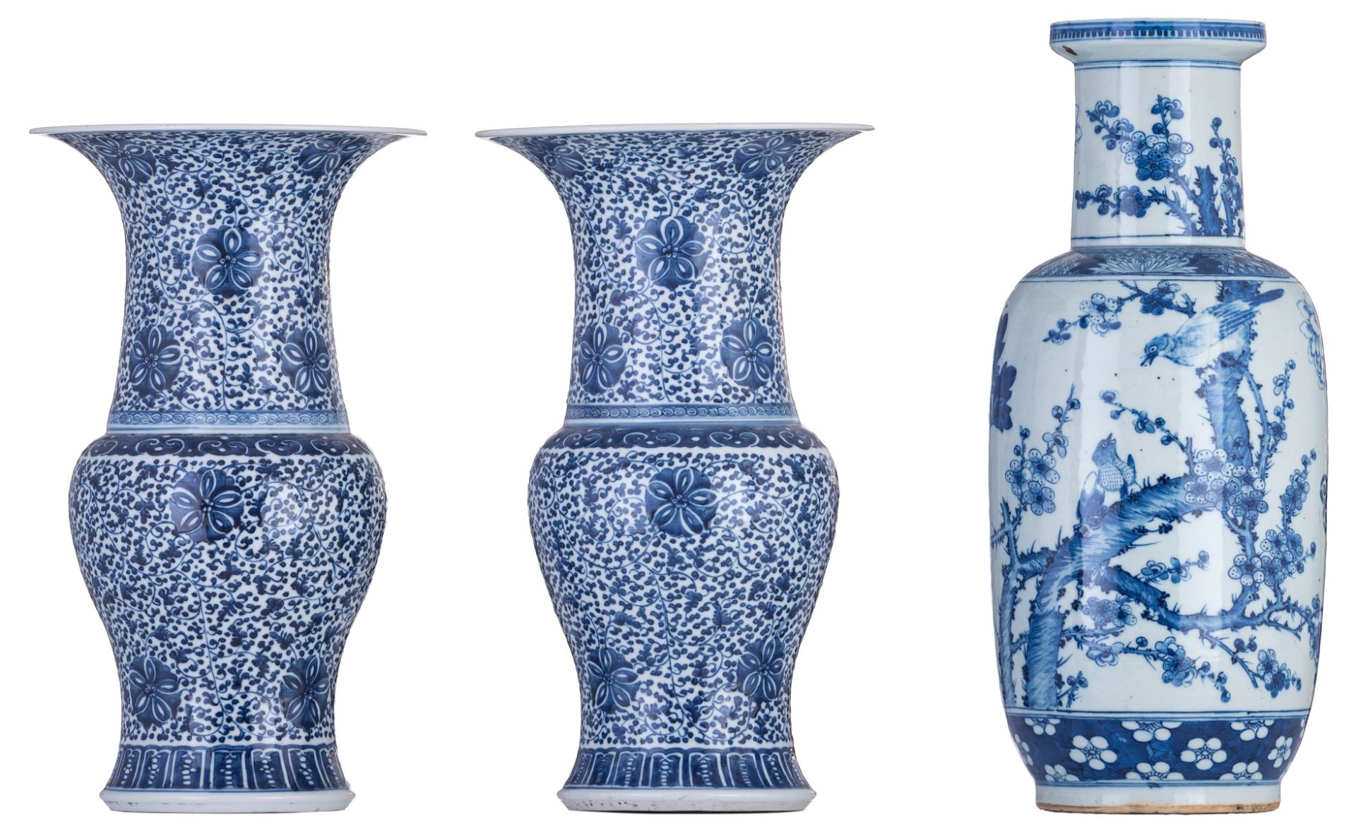 Two Chinese floral decorated baluster shaped vases, with a four character mark; added a ditto roulea