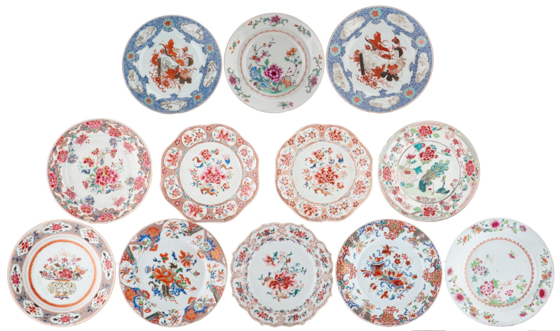 A pair of Chinese famille rose lobed dishes; added ten ditto and polychrome dishes, 18thC, ø 22,5 -