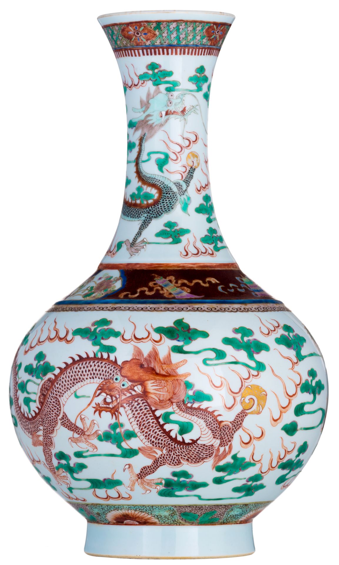 A Chinese famille verte bottle vase, decorated with dragons chasing the flaming pearl, with a Guangx