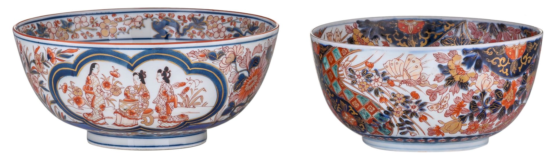 Two large Japanese Arita Imari bowls, one with a five clawed dragon in the centre and borders with a