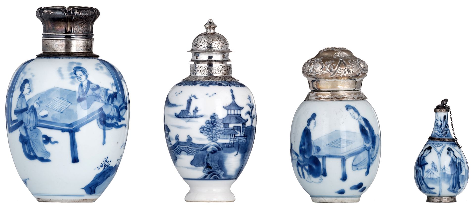 A lot of four small Chinese porcelain blue and white vases with silver mounts, three decorated with