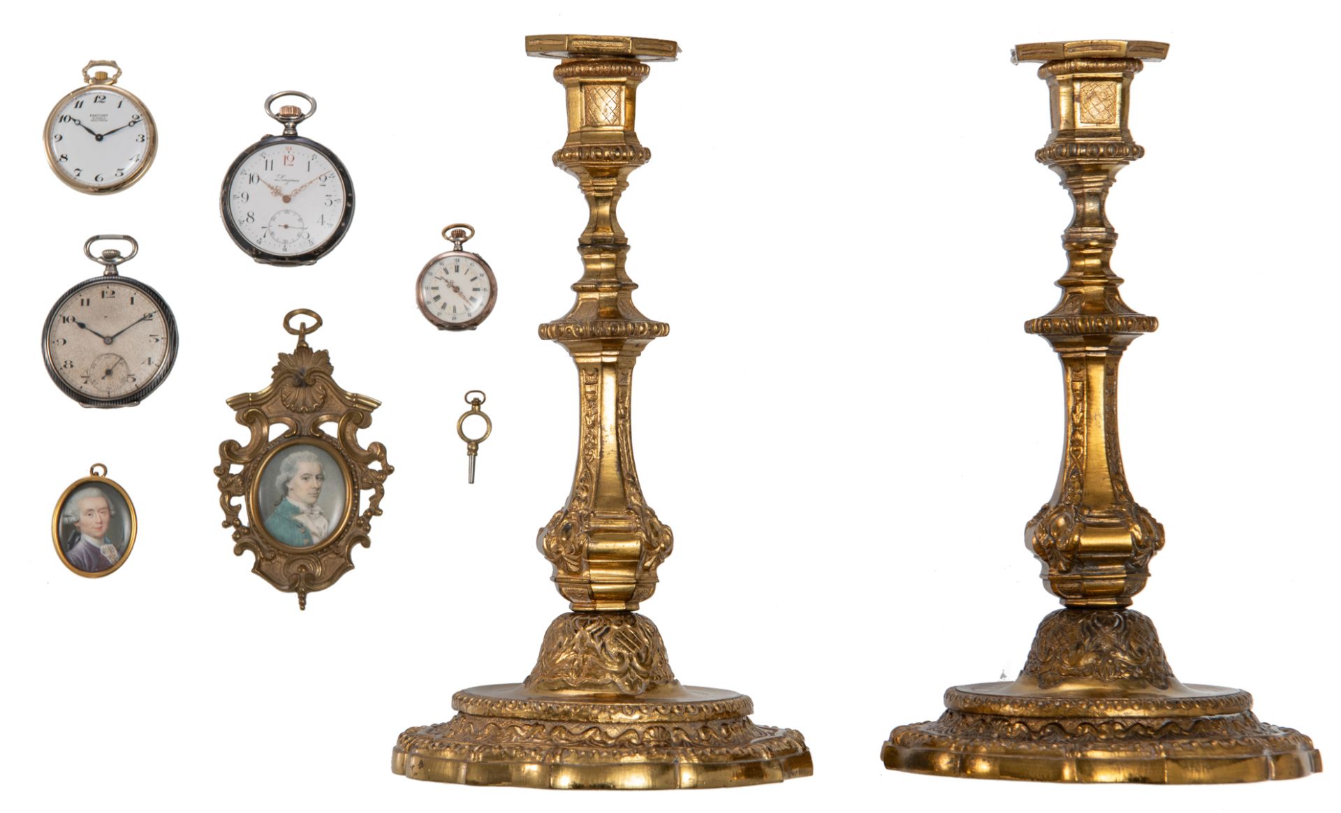 A pair of French gilt brass Régence style candlesticks, late 19thC, h 24,8 cm; added two 19thC niëll
