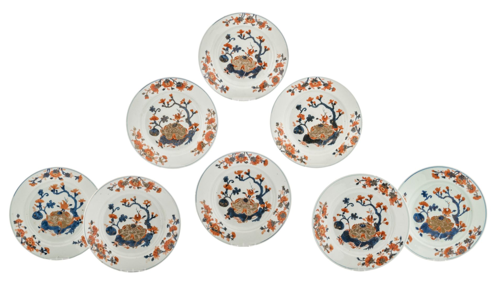 A lot of eight Chinese Imari porcelain dishes, decorated with a flower shrub at a lotus pond, first