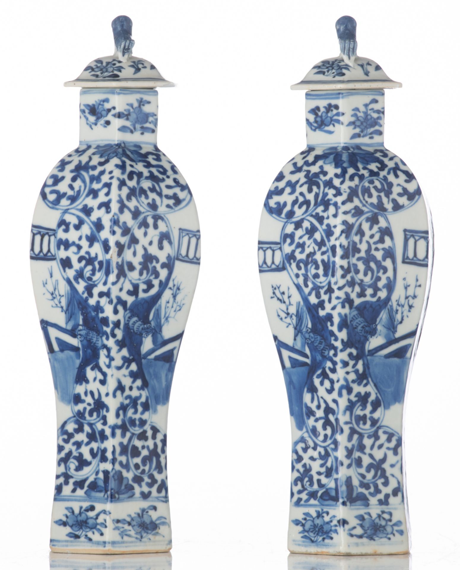 A pair of Chinese hexagonal porcelain vases and covers, blue and white decorated with figures in a p - Image 2 of 7