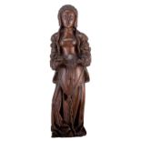 An oak sculpture of a female Saint, later 16thC, the Netherlands, H 71,5 cm