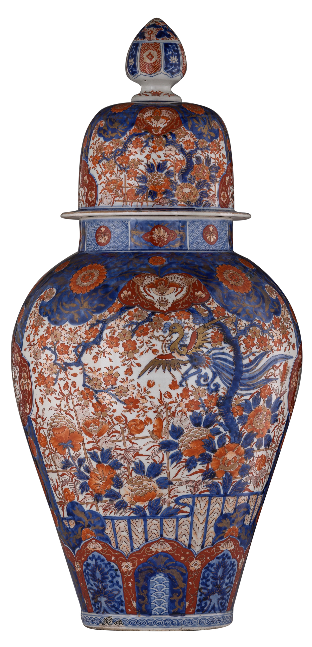 A large Japanese Arita Imari covered jar, decorated with flower sprays and with two large panels, fi