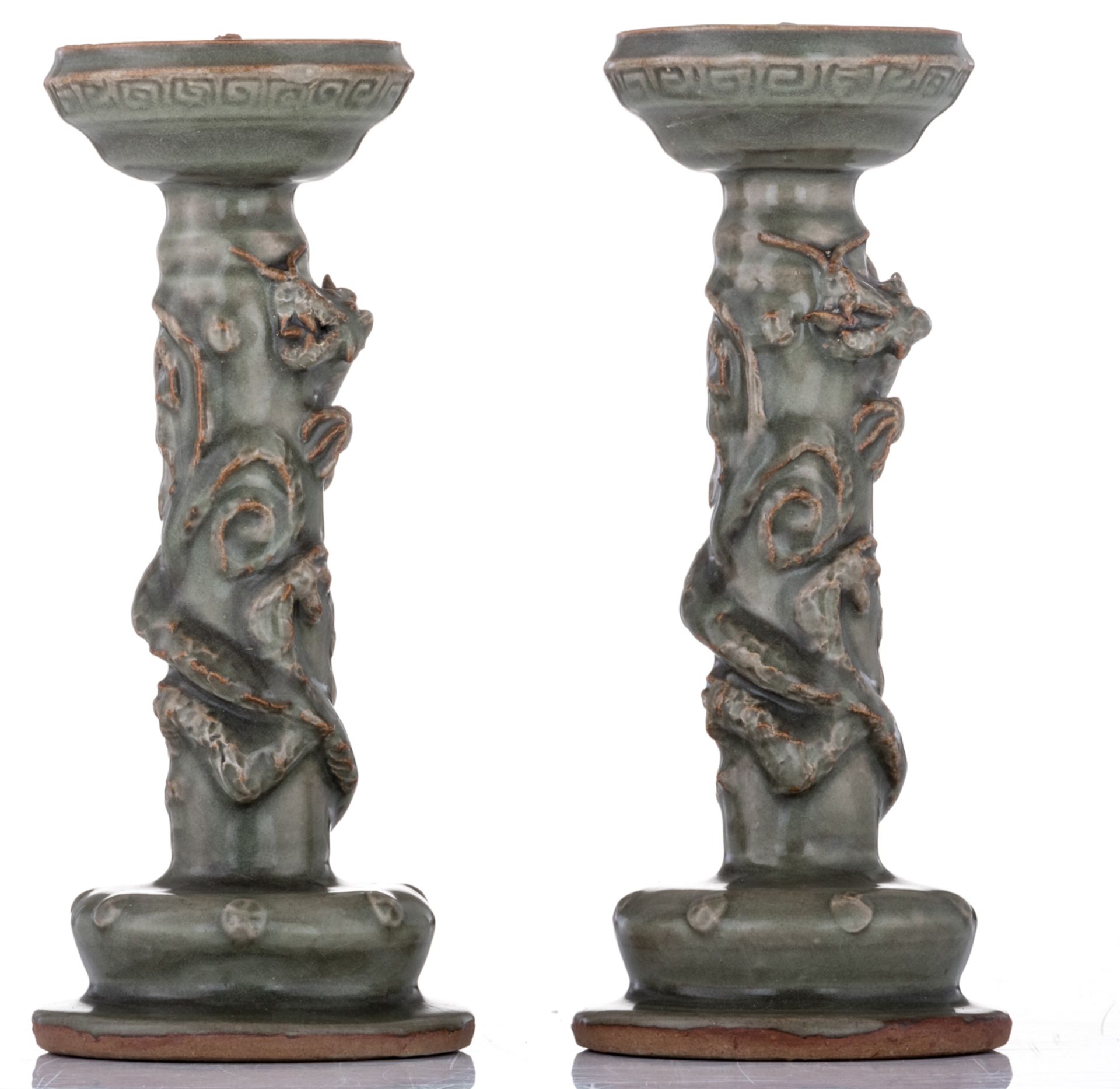 A pair of Chinese celadon stoneware candlesticks, relief decorated with three clawed dragons, Longqu - Image 4 of 6