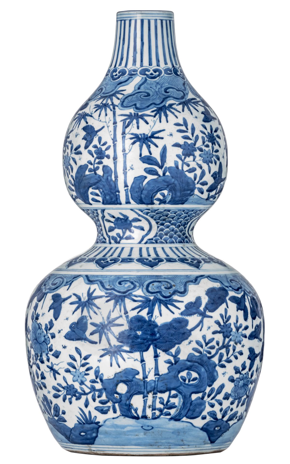 A Chinese blue and white double gourd vase, decorated with birds, wandering between the three friend