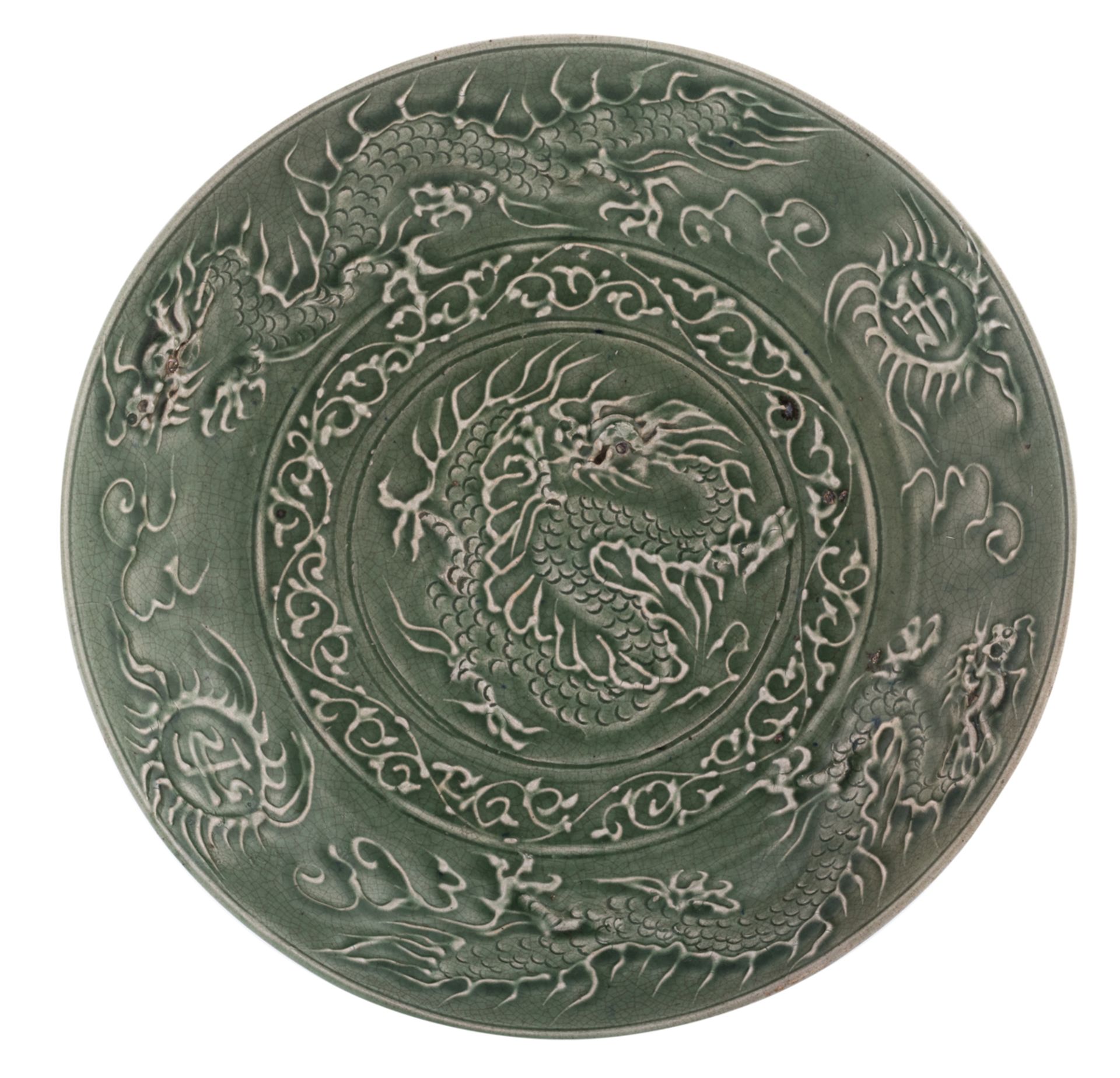 A Chinese celadon porcelain plate, decorated with dragons chasing the flaming pearl in appliqué, H 7