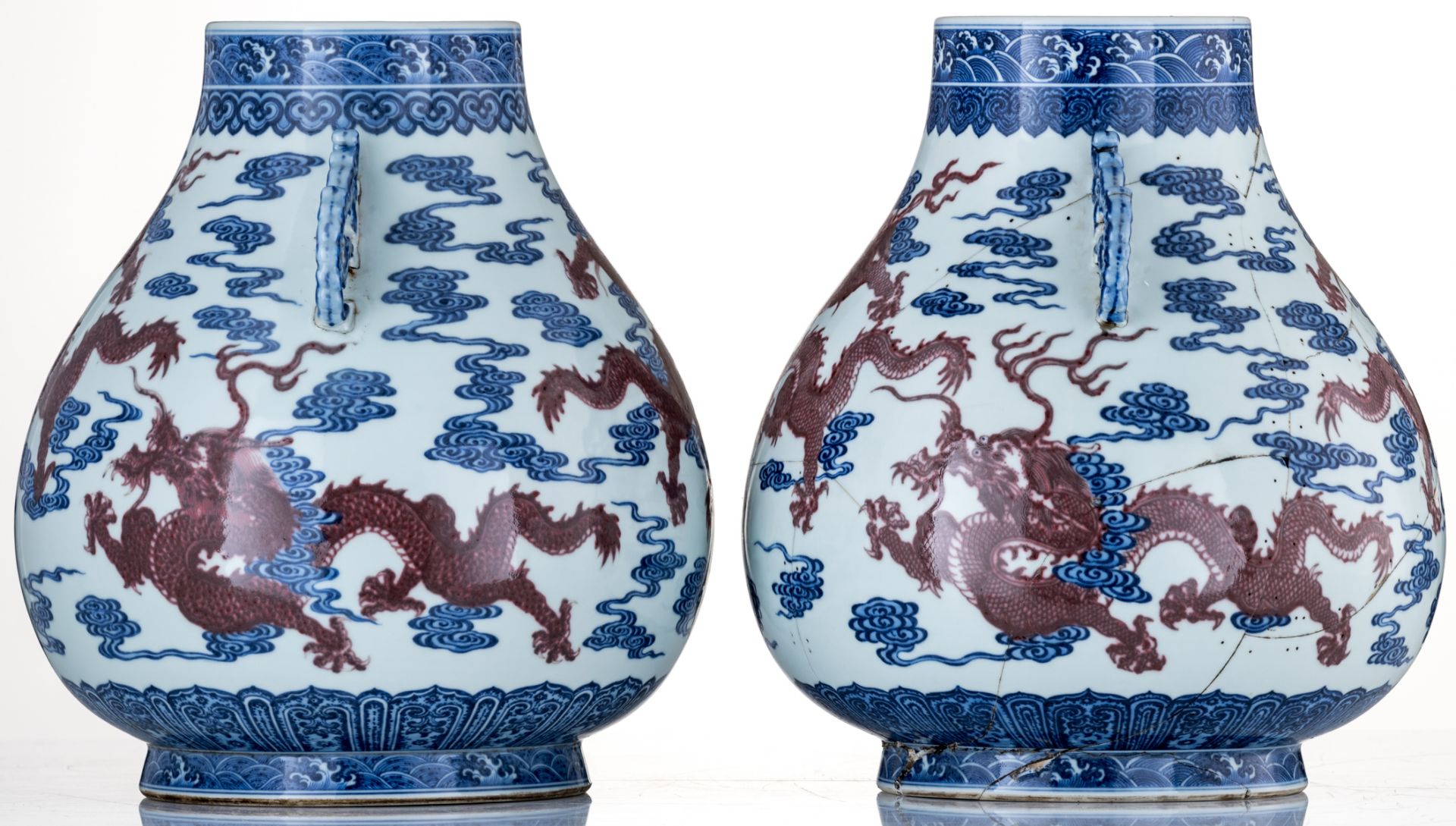 A near pair of Chinese cobalt blue and copper red Hu vases, decorated with dragons amongst clouds, t - Bild 2 aus 6