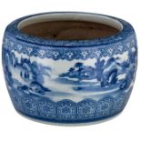 A Japanese blue and white jardiniere, overall decorated with a mountainous riverlandscape, 19thC, H
