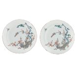 A fine pair of Chinese Kakiemon style dishes, decorated with birds on a flower branch, 18thC, ø 21 c