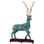 A Chinese cloisonné deer on a wooden base, H 75 (with base) - 69 cm (without base)