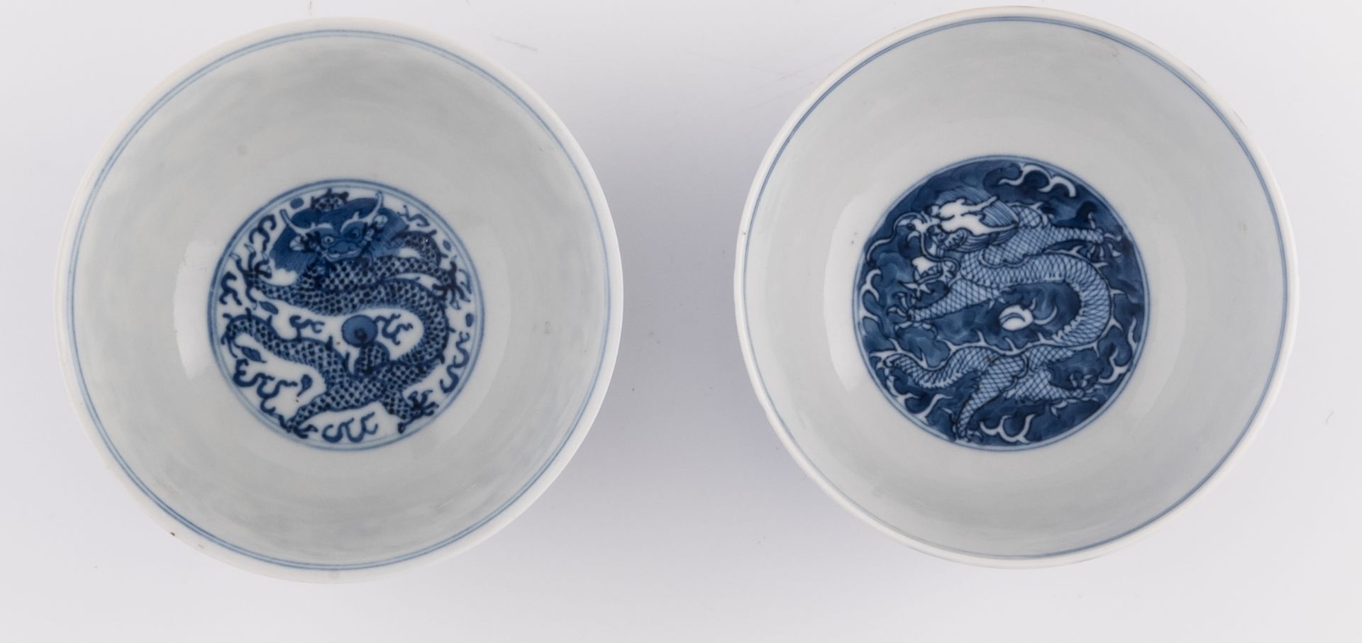 Two Chinese blue and white dragon decorated bowls, with a Kangxi mark, H 5,5 - 6 - ø 12,5 - 13 cm - Image 6 of 7
