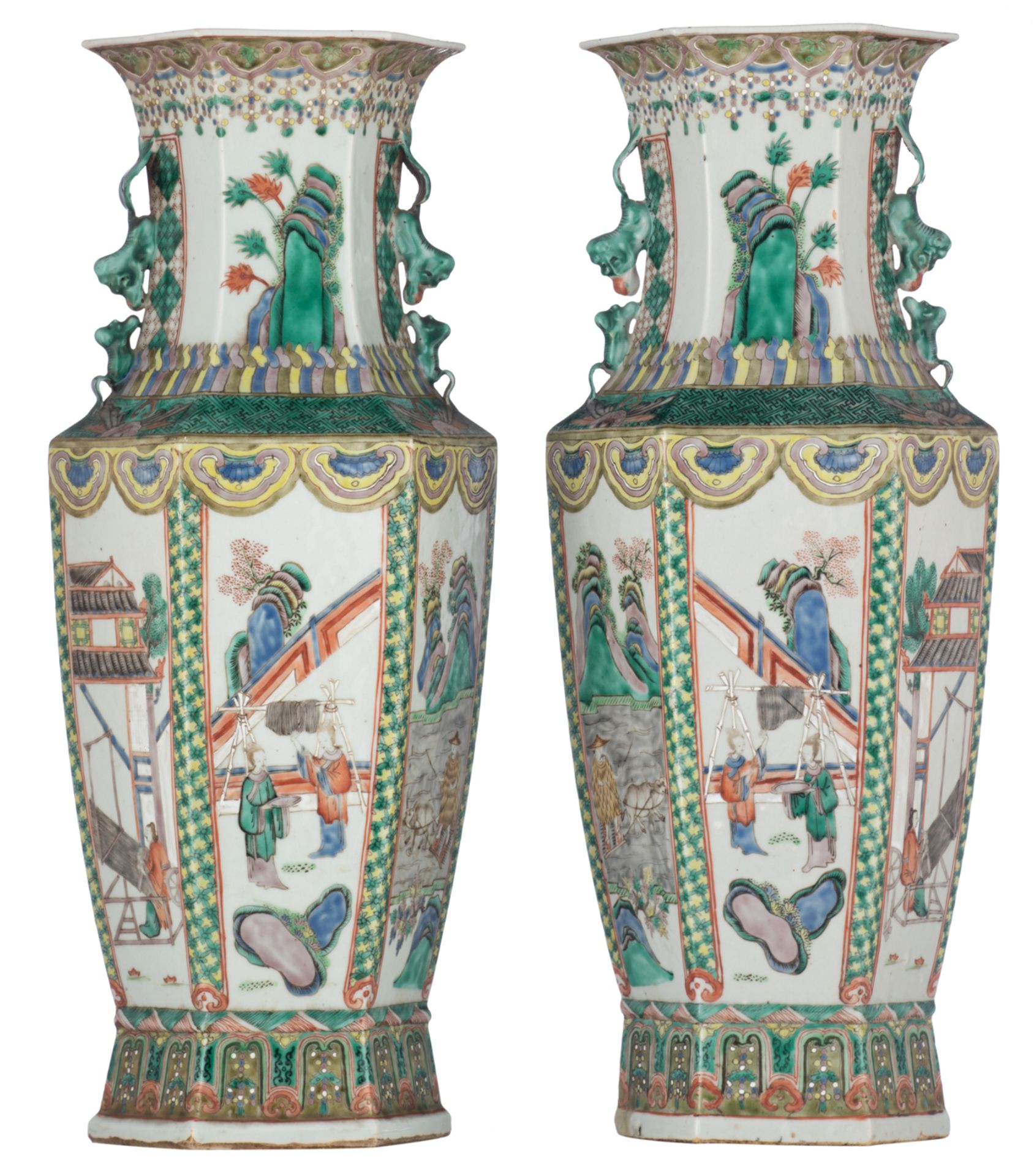 A pair of Chinese famille verte hexagonal vases, the panels decorated with daily life scenes, 19thC,