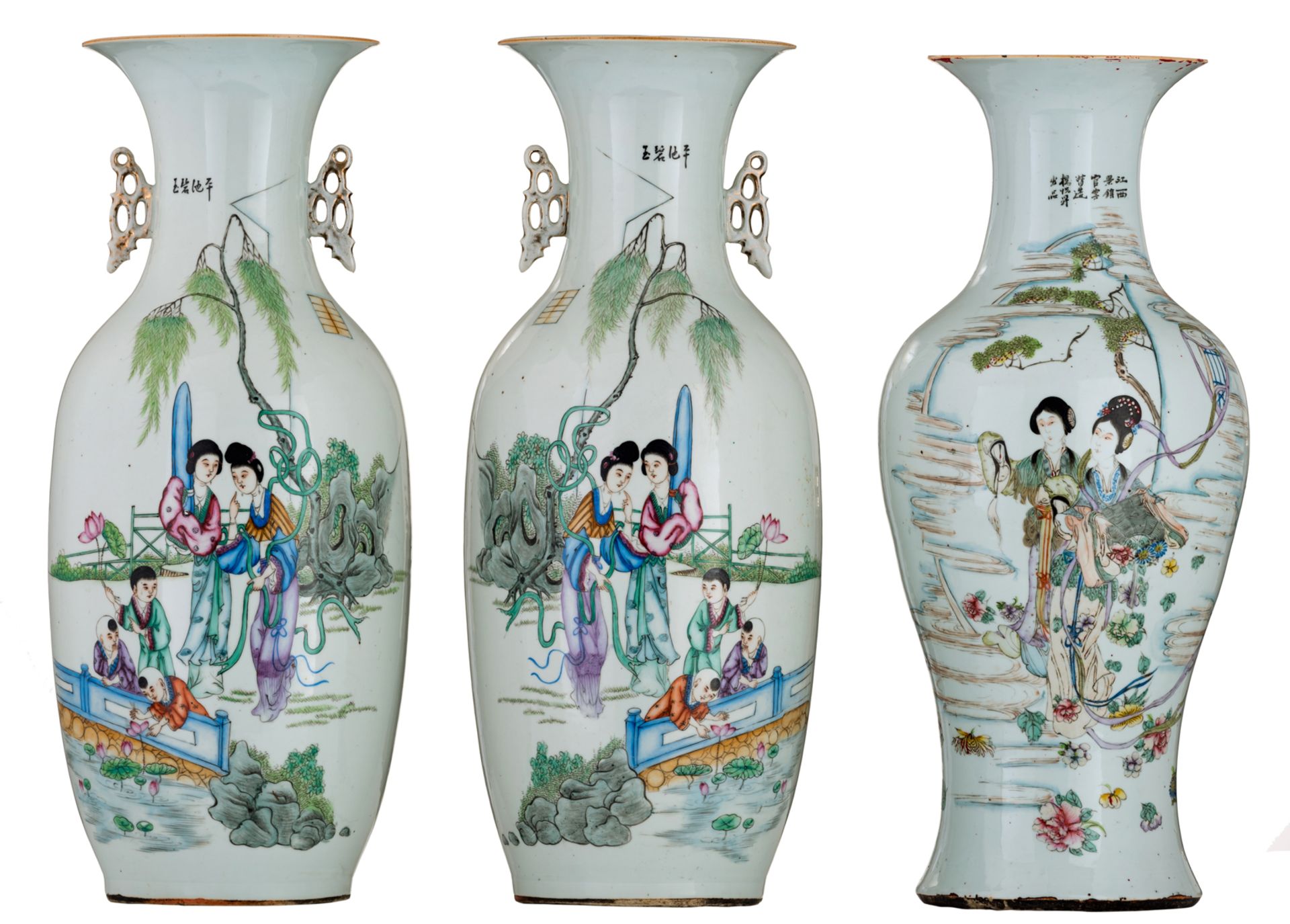 A pair of Chinese famille rose vases, decorated with women and children, wandering in a landscape, t