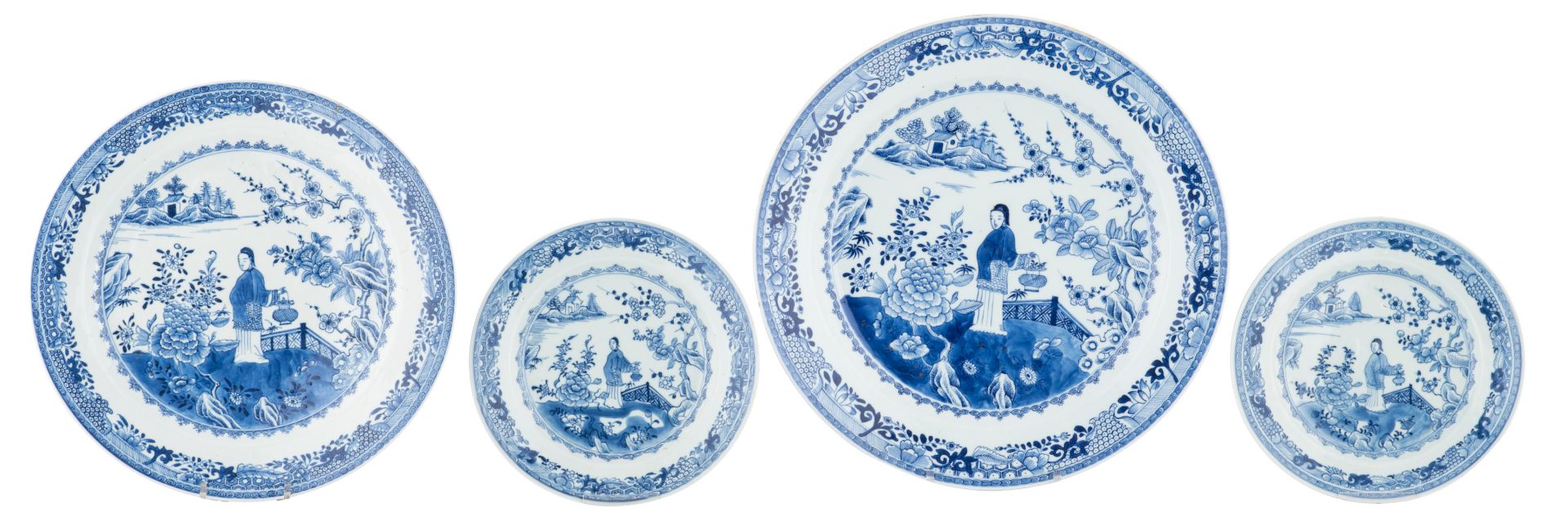 Two Chinese blue and white floral decorated export porcelain plates and two ditto dishes, the well d