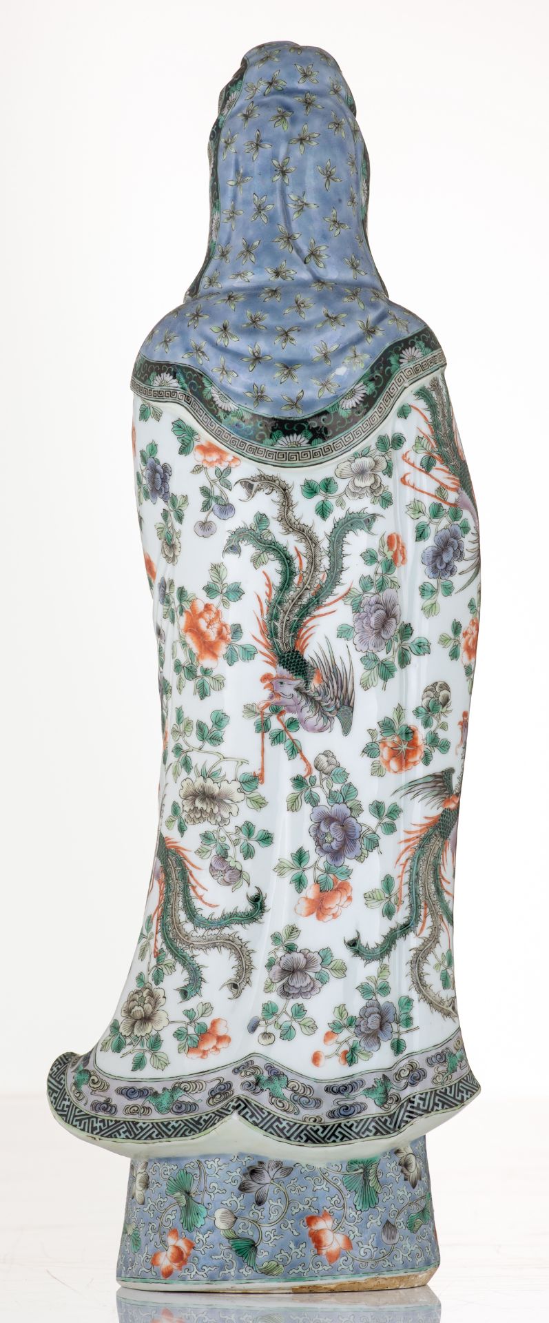 A Chinese polychrome and floral decorated Guanyin, the garment decorated with mythical birds, marked - Image 3 of 6