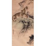 Liu Kuiling, a scroll depicting leopards in a mountain landscape, 64,5 x 133,5 - 79,5 x 227 cm