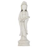 A Chinese blanc de chine Guanyin, holding a ruyi sceptre, 20thC, H 45 cm