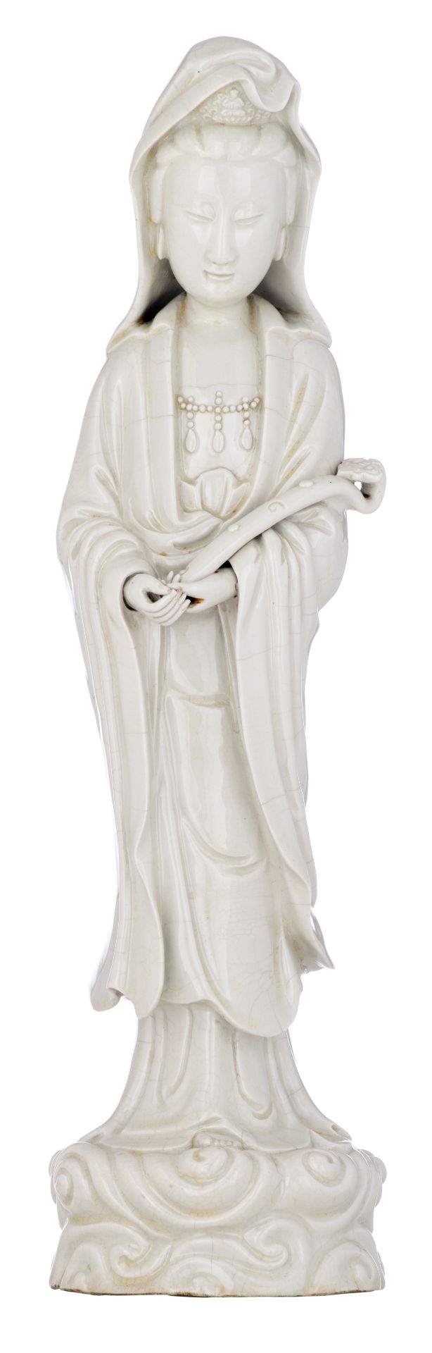 A Chinese blanc de chine Guanyin, holding a ruyi sceptre, 20thC, H 45 cm