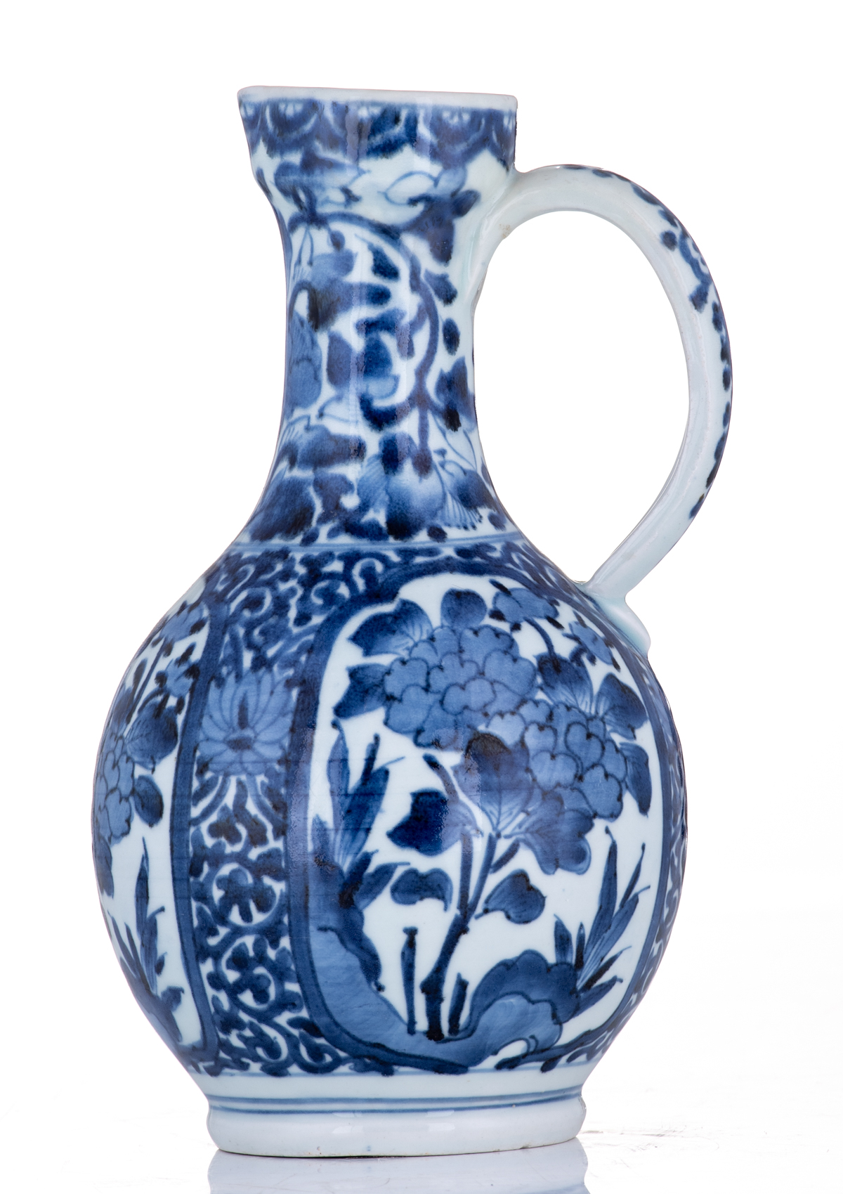 A Japanese last quarter of the 17thC Arita jug, with blue and white scrollwork all over, and roundel - Image 4 of 8