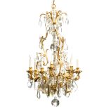 A gilt bronze chandelier embellished with crystal beads and drops, H 135 - ø 60 cm