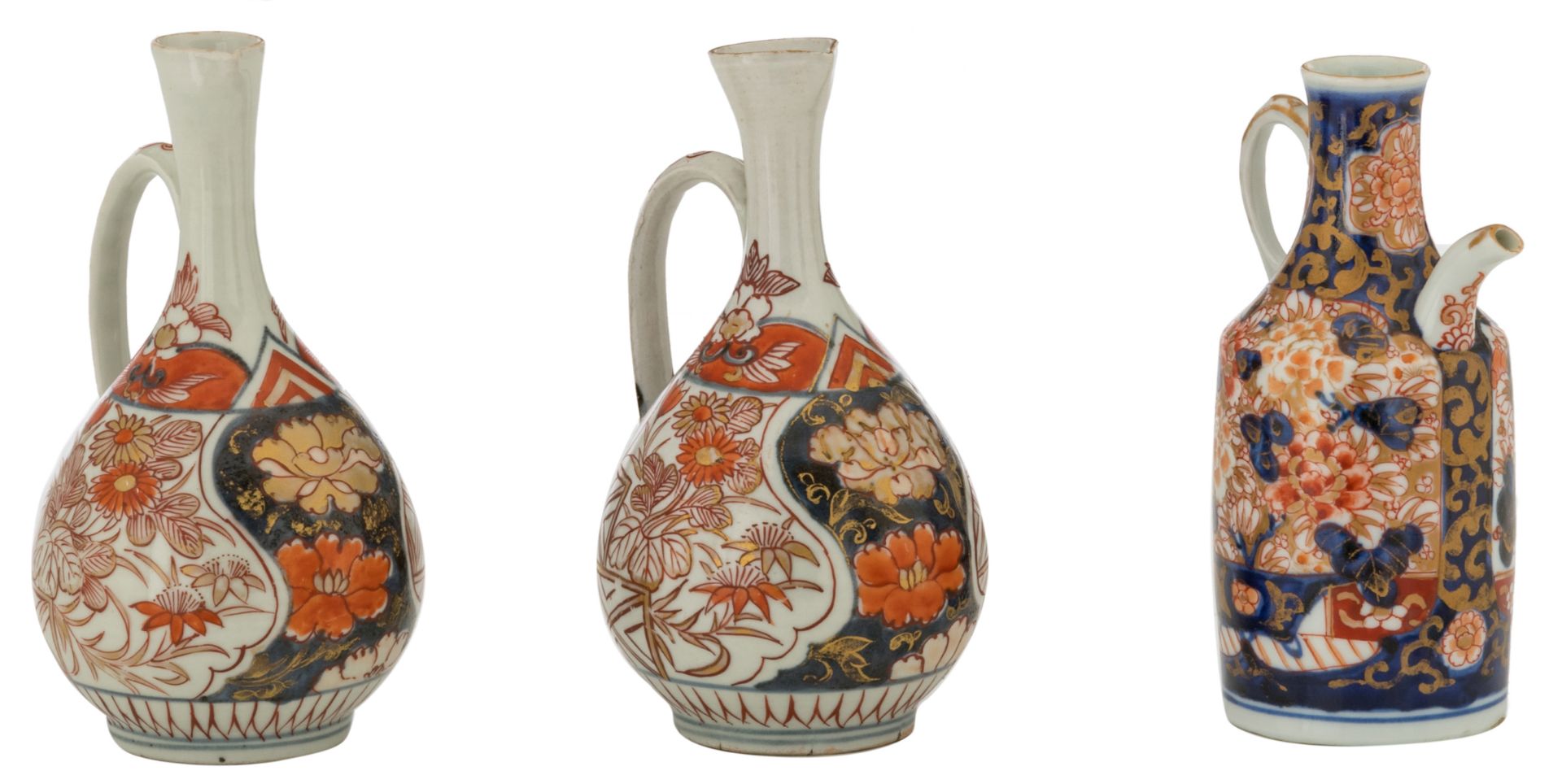 A lot of three Japanese Arita Imari sake ewers, 18thC, H 17 cm