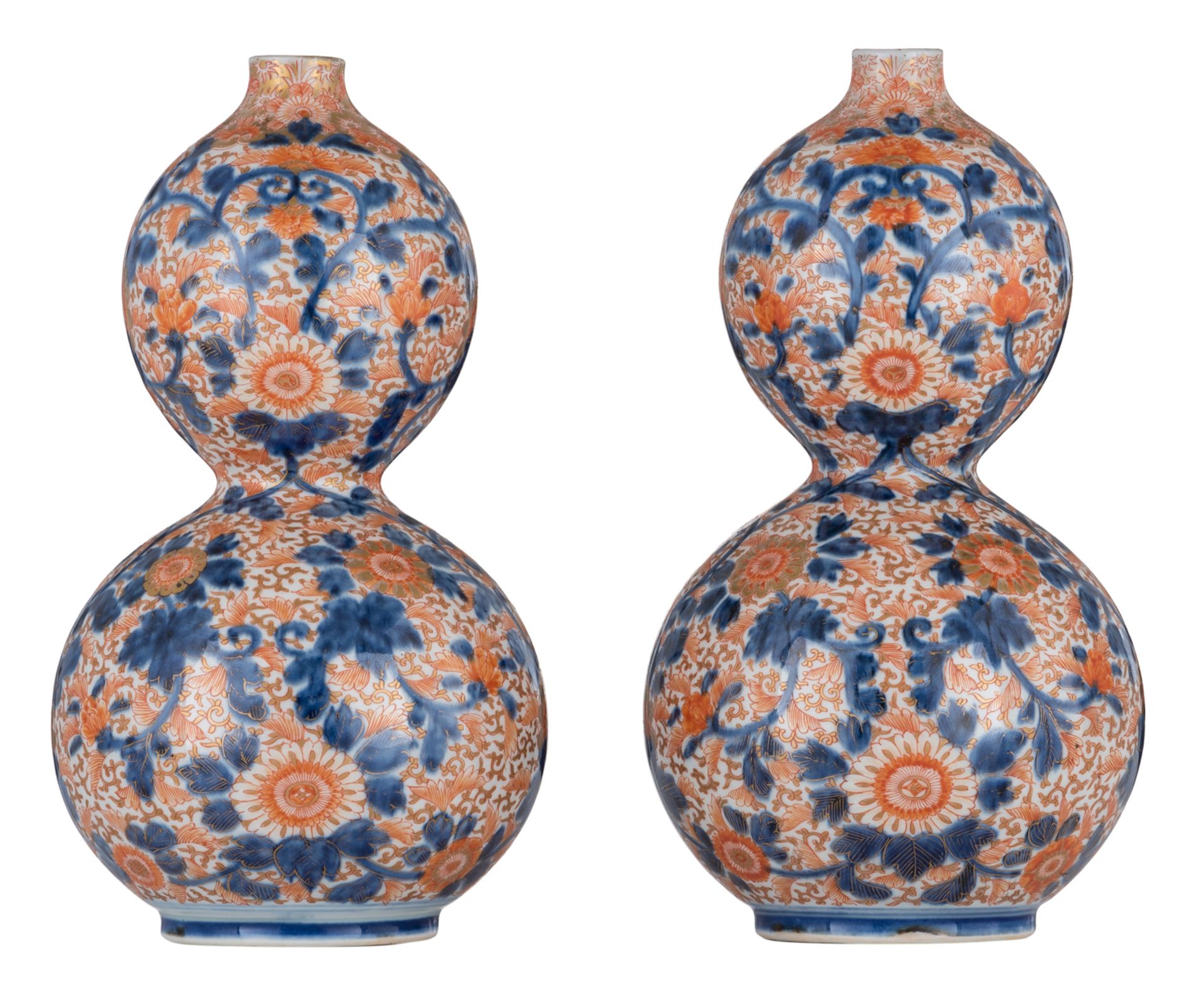 A fine pair of two Japanese Arita Imari double gourd vases, decorated with flower branches, later 18