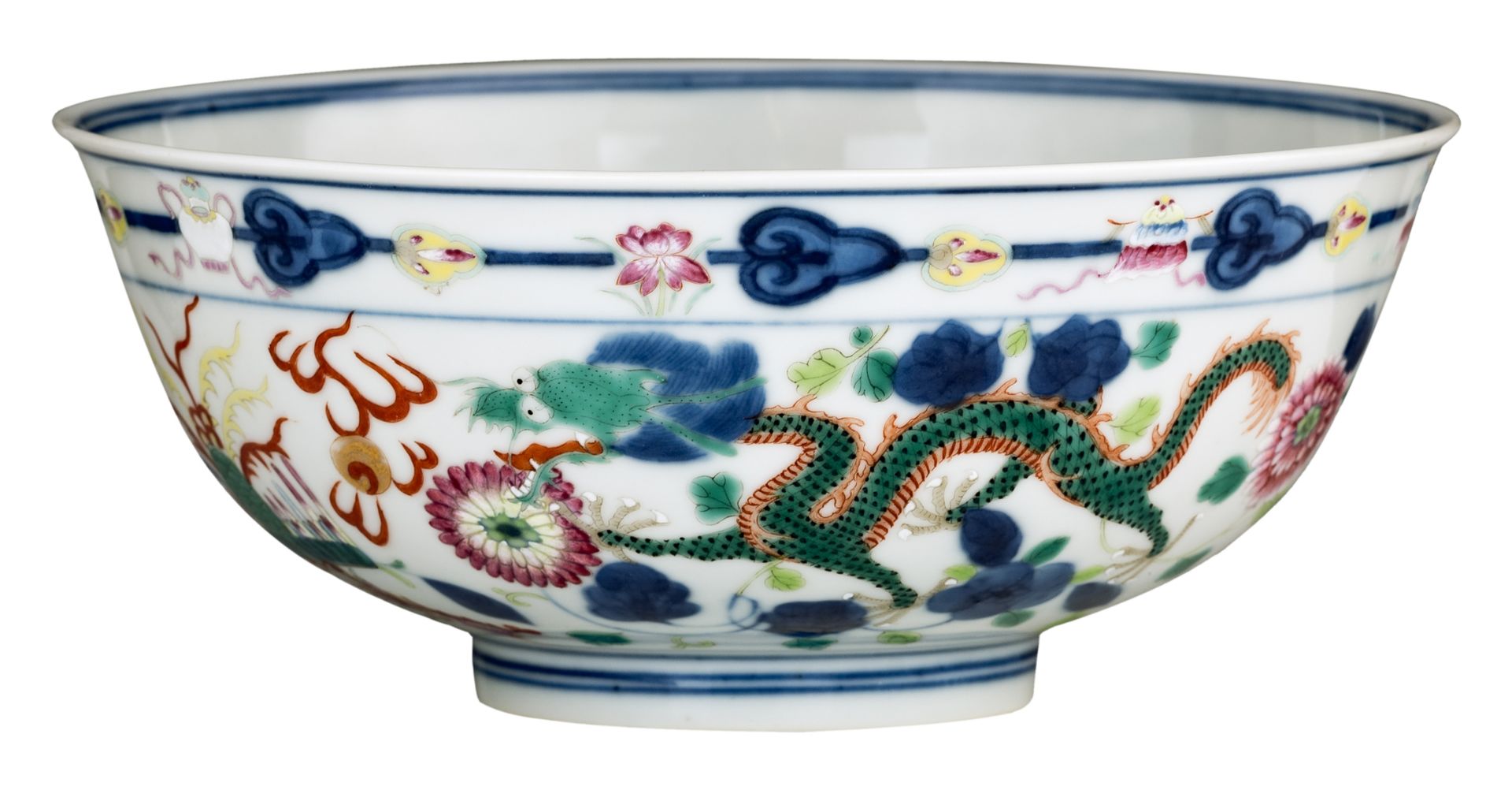 A Chinese polychrome bowl, decorated with flowers and dragons, chasing the flaming pearl, with a Ton