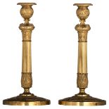 A fine pair of gilt bronze neoclassical candlesticks, first quarter of the 19thC, H 33,5 cm, ex Soth