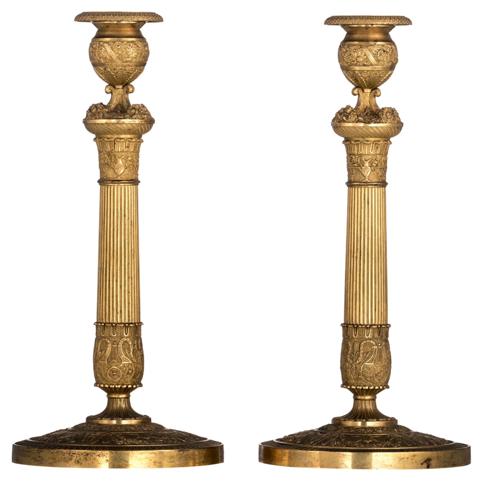 A fine pair of gilt bronze neoclassical candlesticks, first quarter of the 19thC, H 33,5 cm, ex Soth